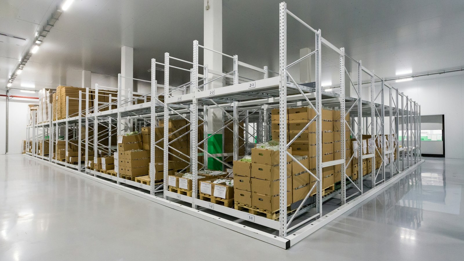 Organized warehouse storage system - Petr Magera on Unsplash